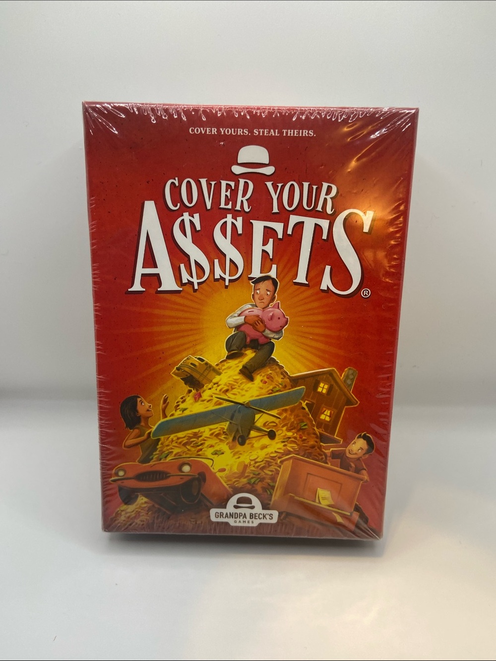 Cover your assets card game 7-99/ 2-6 players